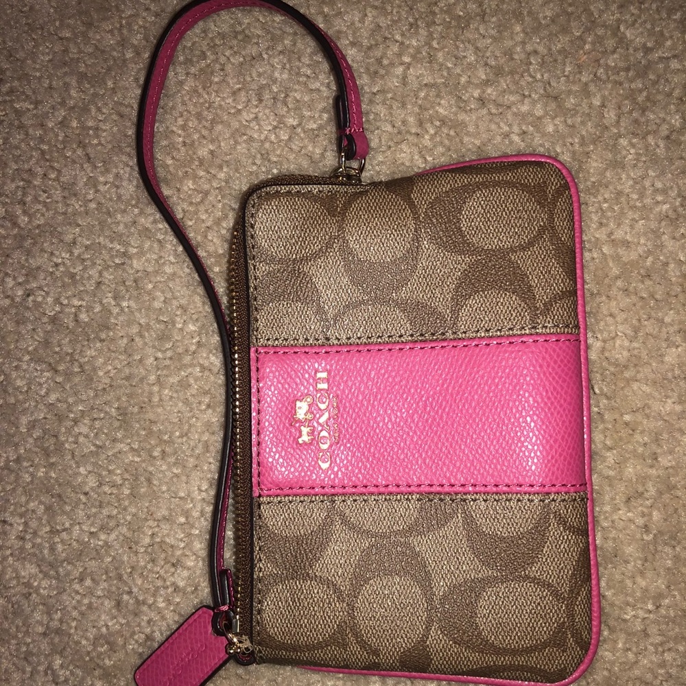 Never used coach wristlet!